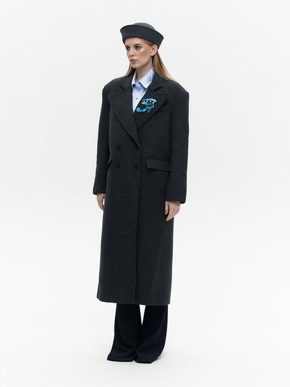 Wool coat with the blue eye patch